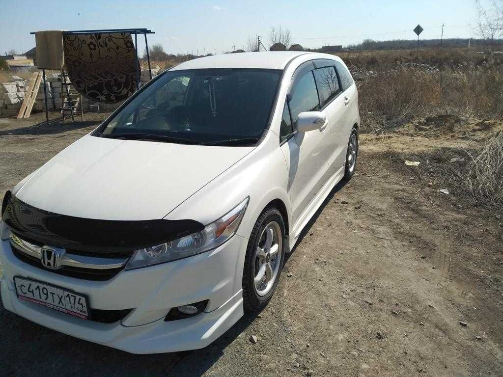 Honda stream 2010 год. Где находится домкрат на Хонда стрим 2010 года.