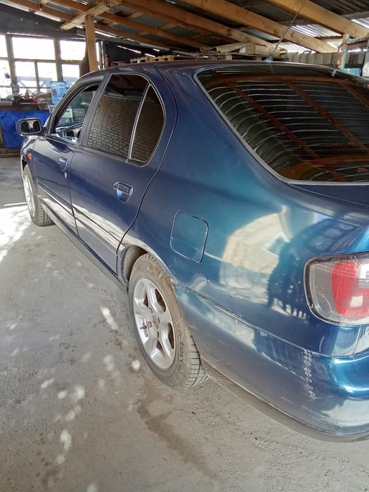 Ниссан примера п11