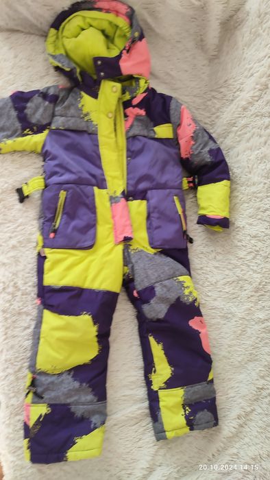 Продам детский зимний комбинезон для девочки