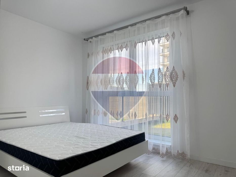 Inchiriere Apartament cu 2 camere, grădină de 62 mp și parcare
