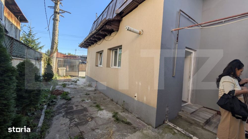 Casa cu 2 camere si mansarda ,plus bucatarie de vara .