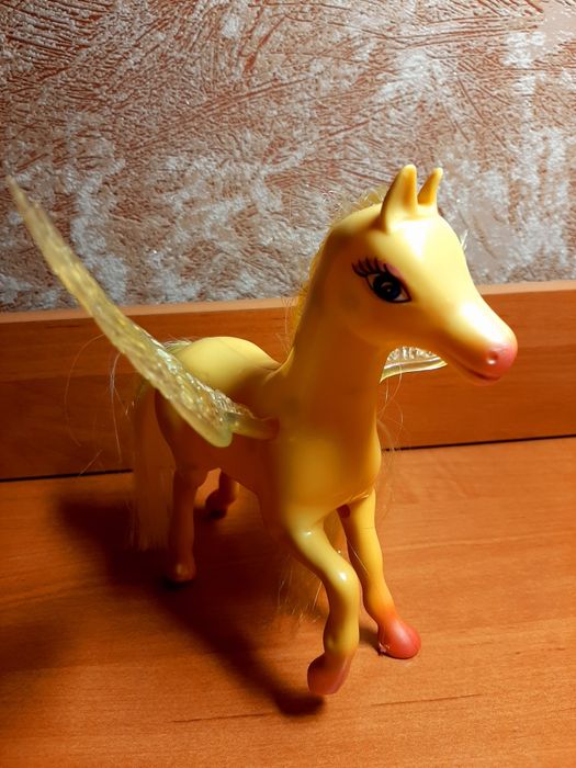 Детская игрушка лошадка