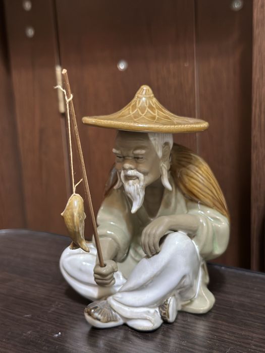 bibelou chinezesc cu undita si peste