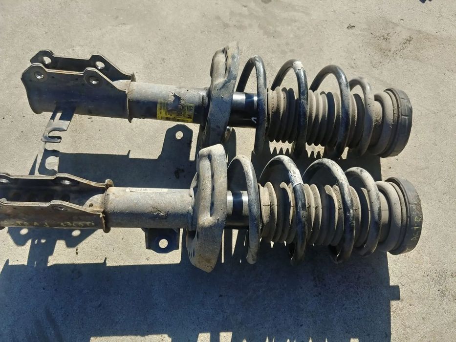 set ansamblu amortizoare telescoape cu arcuri fata 1.7cdti a17dtr opel astra j  13310100  13310099