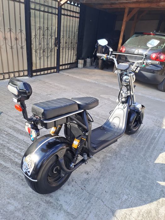 Vand motoscuter electric