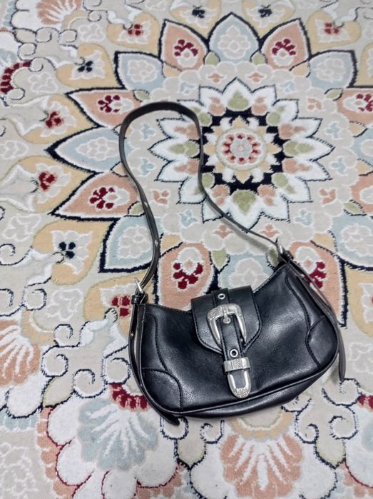 Стильная чёрная сумка — тренд сезона