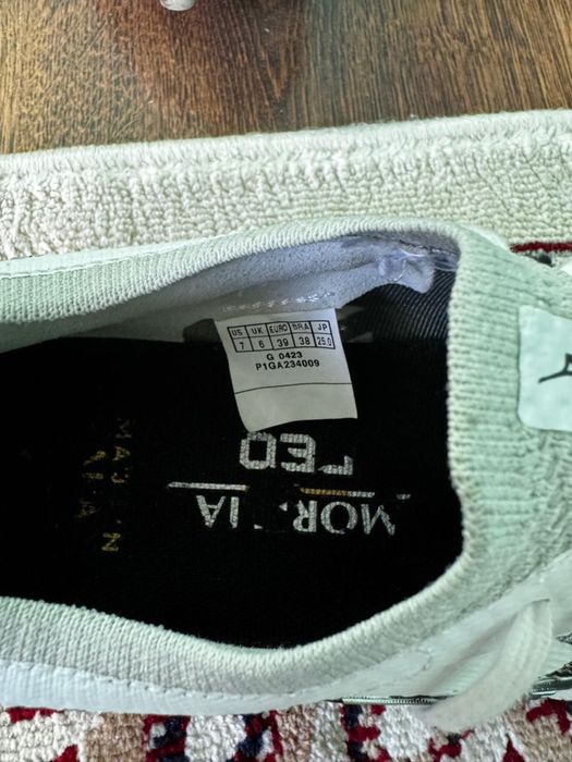 Продам бутсы мезуно новый