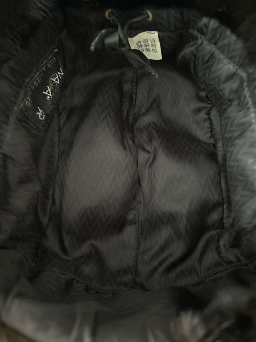 Продам шарку-ушанку в отличном состояний