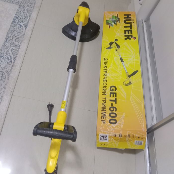 Электрический триммер Новый