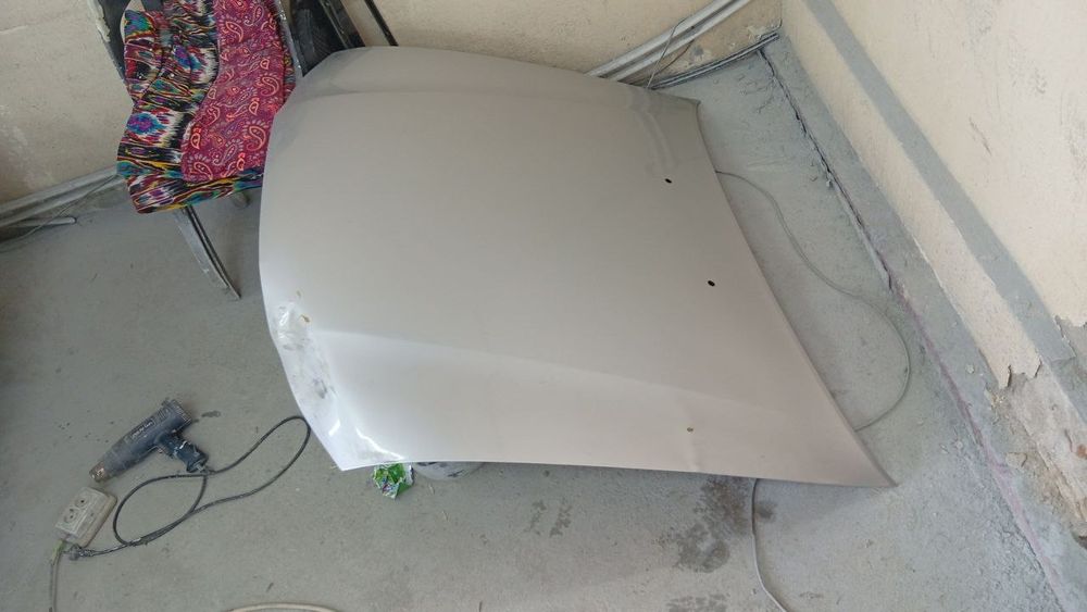 Nexia 2 радной детал крило и капот 2014 йил