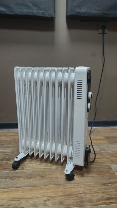 Продам масляный обогреватель, мощность 1500 Вт.