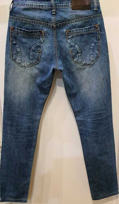 Джинсы на мальчика 14-15 лет.