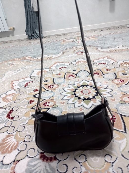 Стильная чёрная сумка — тренд сезона