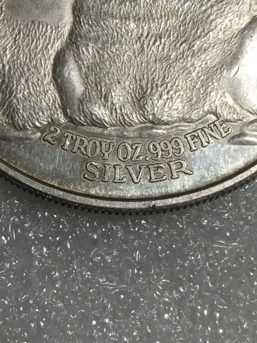Серебрянная двух унцовка