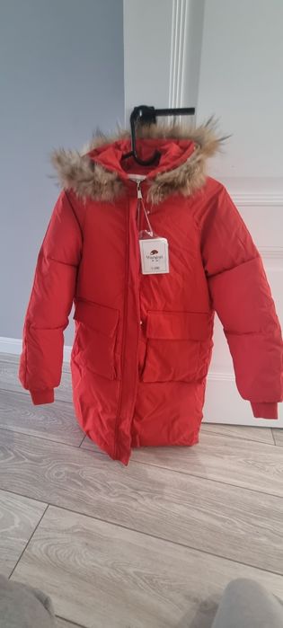 Продам пуховик новый