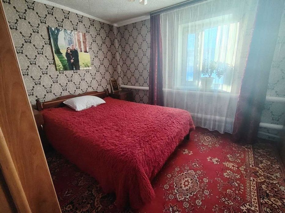 Дом в городе с ухоженным участком