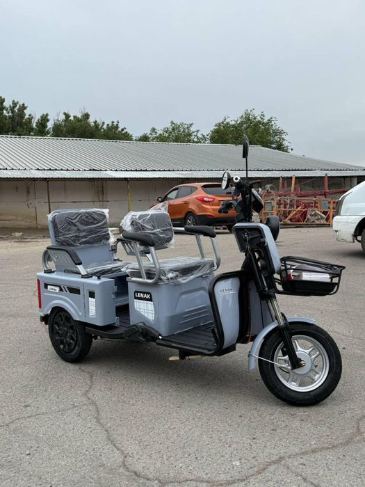 Электроскутер трицикл