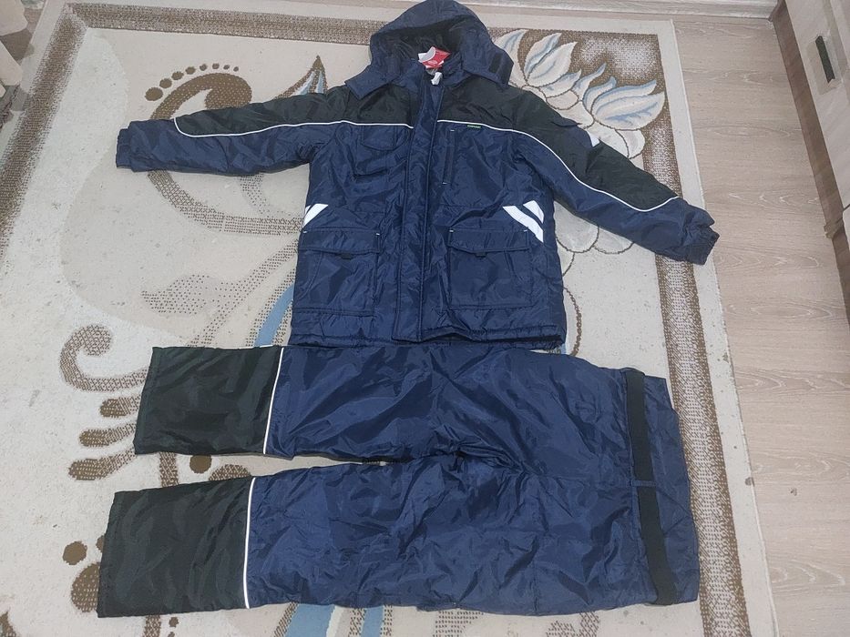 Зимний комбинезон новый