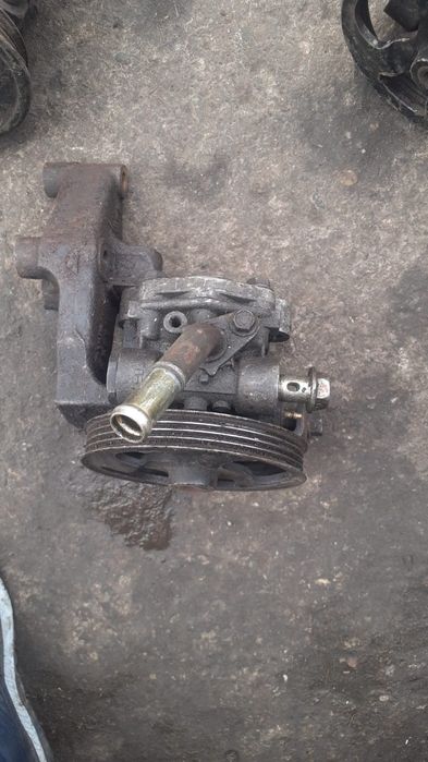 Гур насос  мазда 323