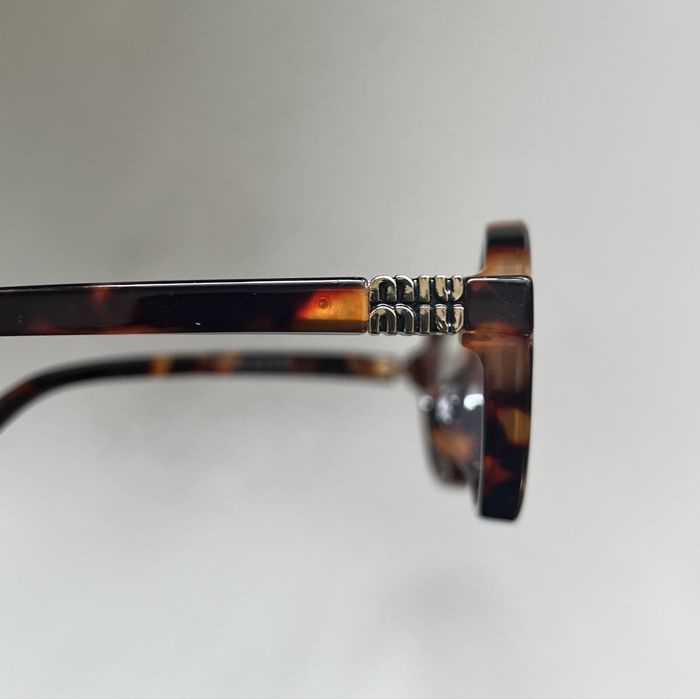 MIU MIU очила MU04ZS