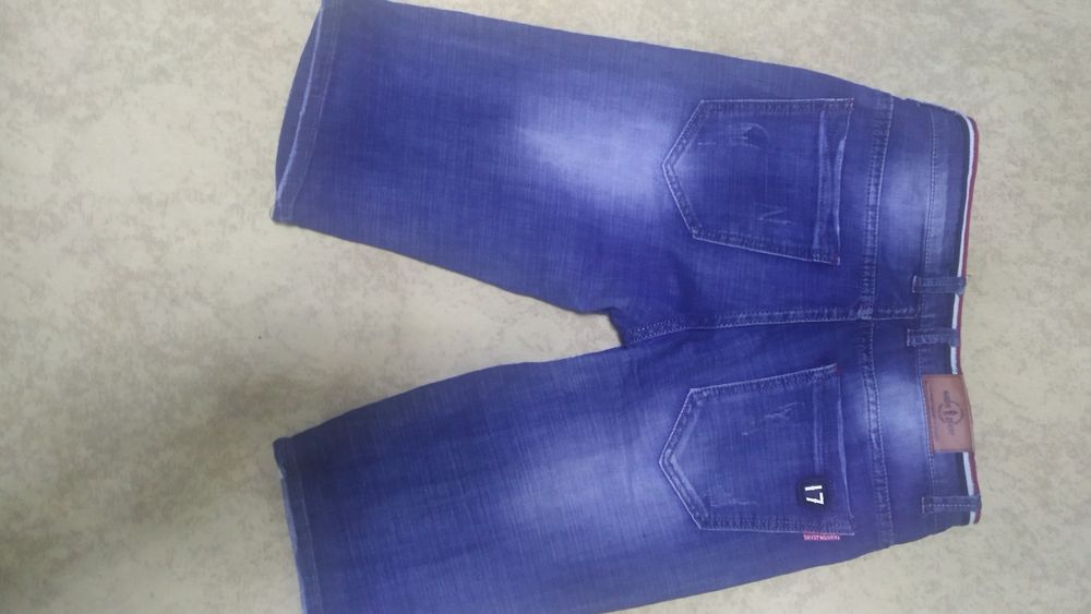 Продам джинсы и шорты на мальчика