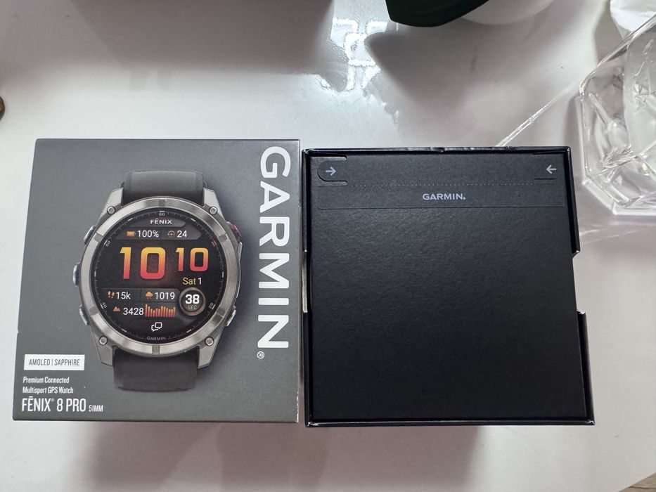 Smartwatch Garmin Fenix 8 Pro, 51mm, AMOLED, LTE, GPS, Wi-Fi, Android/iOS, Sapphire, Titan, curea din silicon Graphite/ Black