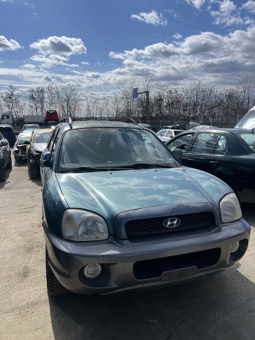 Vand bara fata capota motor 2.0 benzina cutie viteza Hyundai santa fe