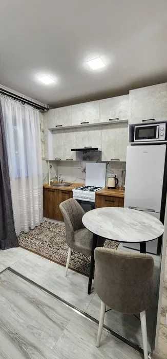 Бузбазар 1/2/4 кирпичный дом Общая площадь 33 кв.м ориентир Анор Банк