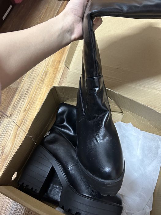 Сапоги с каблуками