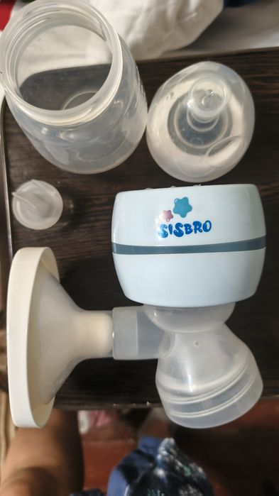 Молокоотсос электрический