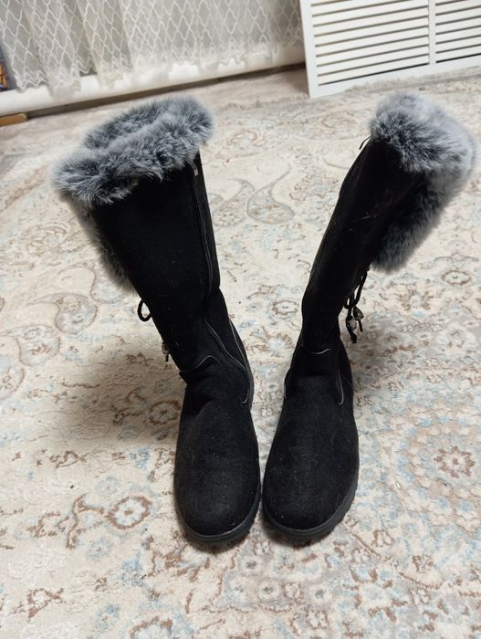 Продам сапоги новые