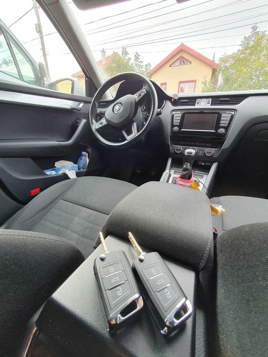 Reparatii contacte auto, programare cheie cu cip sau cheie pierduta