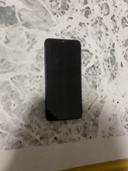 Телефон Редми 9с.