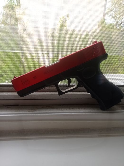 Игрушечный пистолет глок 19