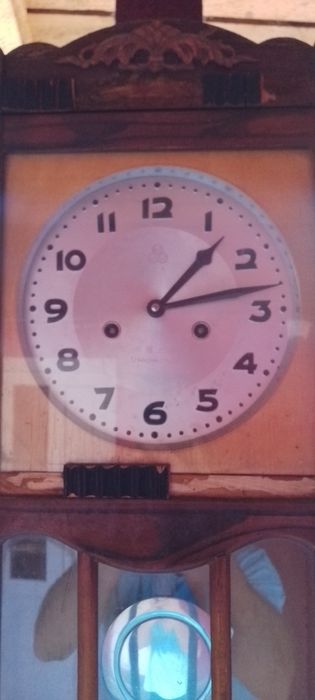 Ceas de perete vechi cu pendul