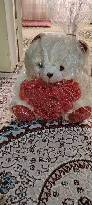 Мяхкий игрушка медведь