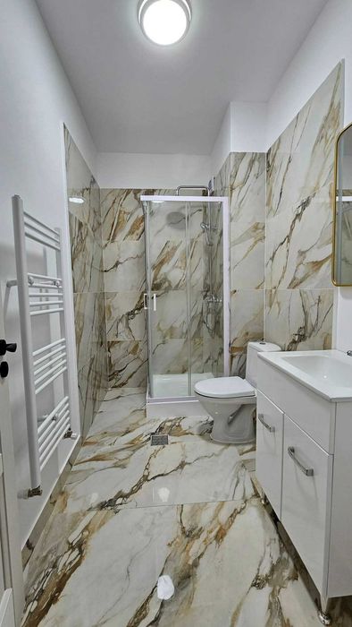 Închiriez apartament cu garaj subteran in bloc nou!