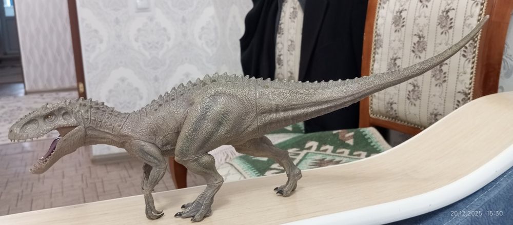 Игрушка динозавр