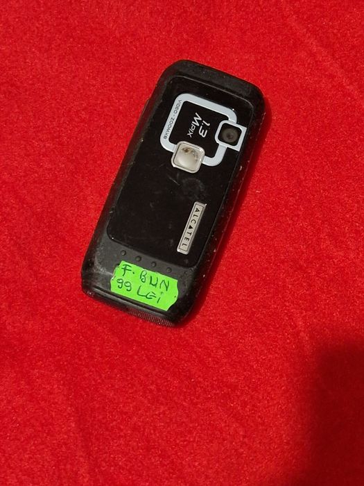 Telefon cu butoane Alcatel cu încărcător