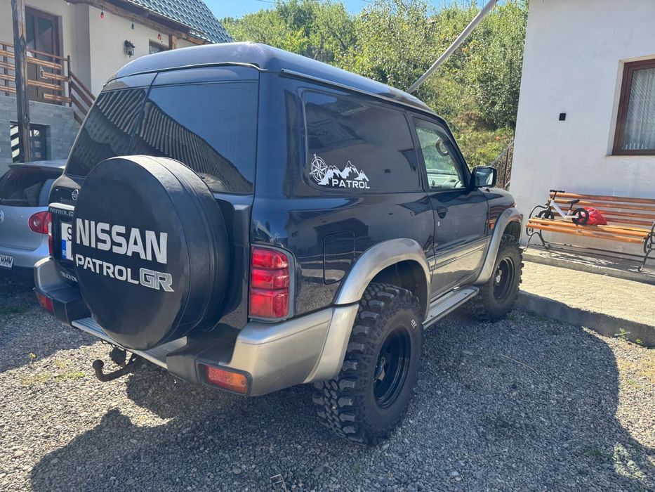 Nissan Patrol Y61 an 2004 zd 3.0 autoutilitara