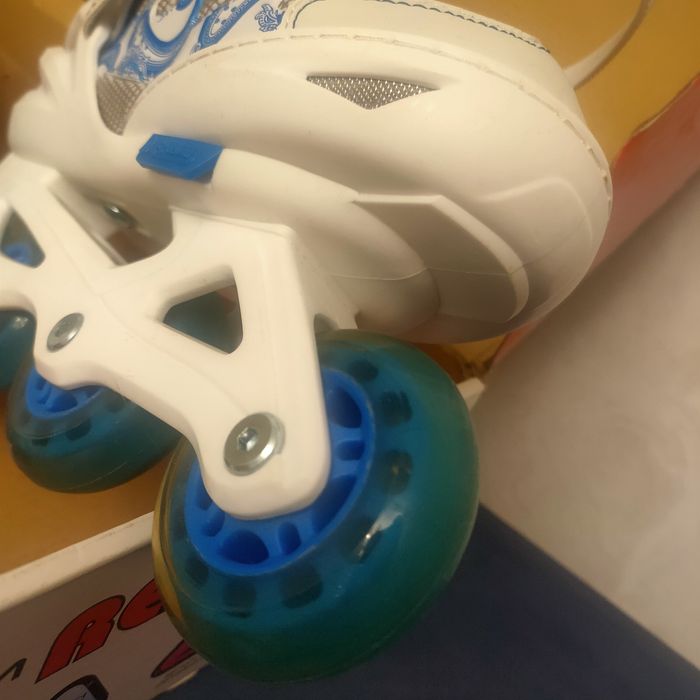 Роликовые коньки