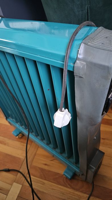 Маслянный обогреватель