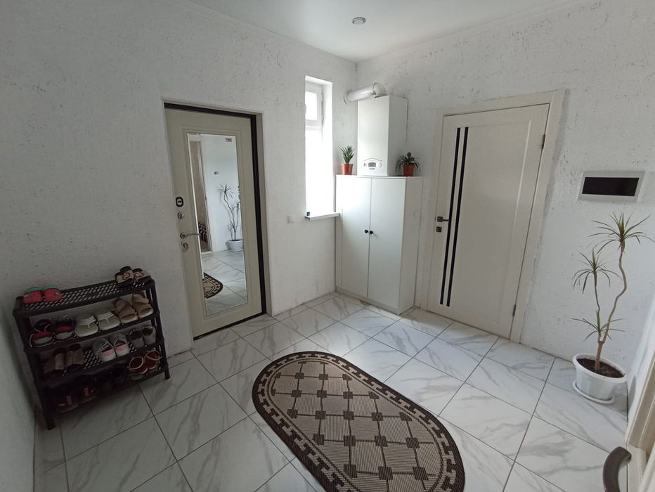 Продам дом сзади Палладиума