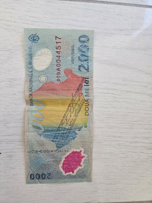 Vand bancnotă 2000 lei cu eclipsa 1999