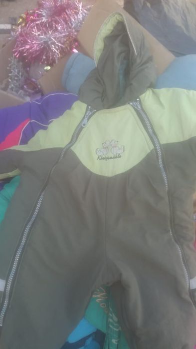 Зимние комбинезоны