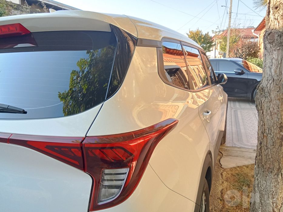 Kia Carens 2- pozitsiya