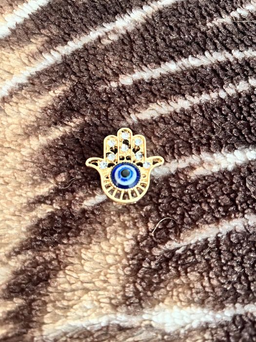 Брошь от сглаза новая.