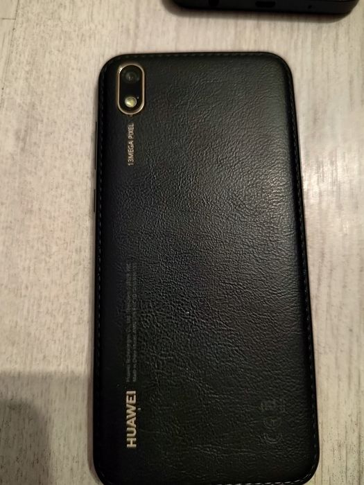 Телефони за части