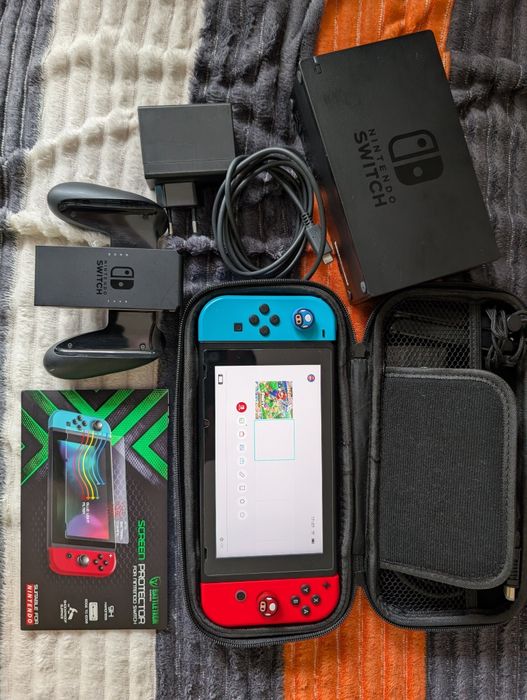Nintendo Switch V2 cu toate accesoriile+ inca in docking portabil