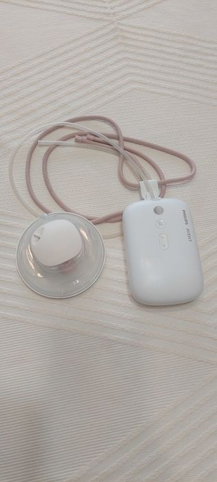 Помпа за кърма и столче за новородено